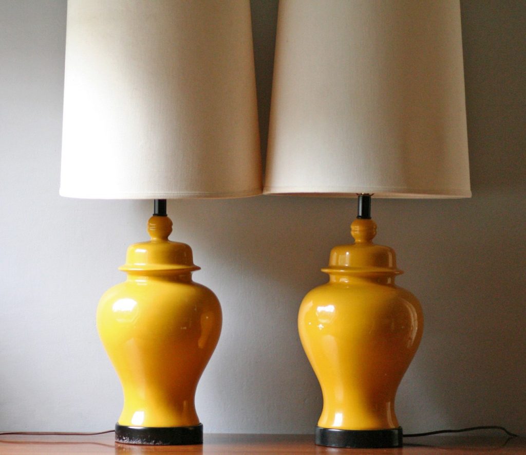 mustard-colored lamp or shelf